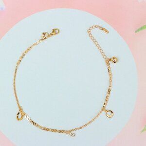 "Rose Gold Anklet with Hollow Charms and Bell, Elegant Chain Design, XPAL1062